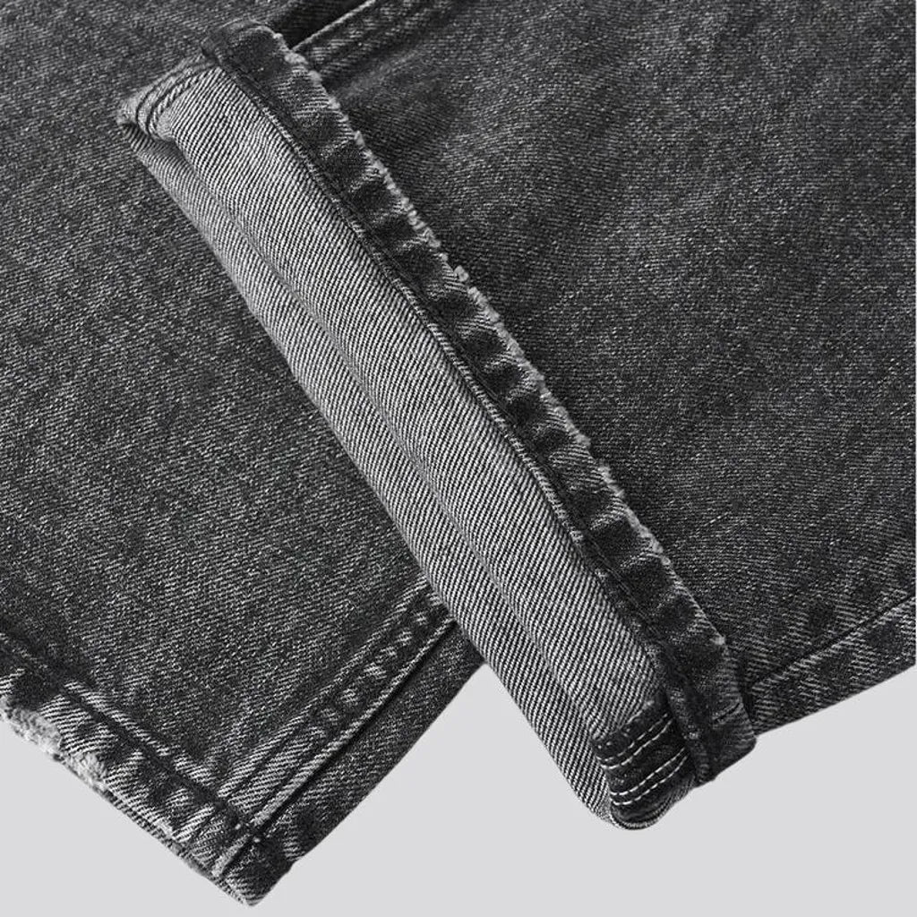 Grunge style vintage whiskered men's jeans