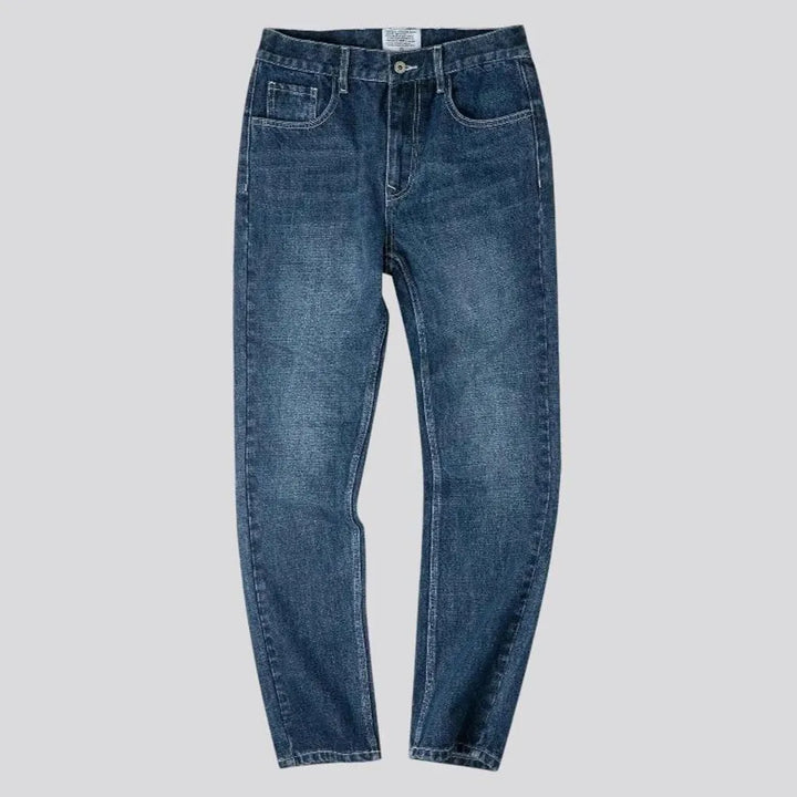 Stonewashed back-cinch tapered men's jeans