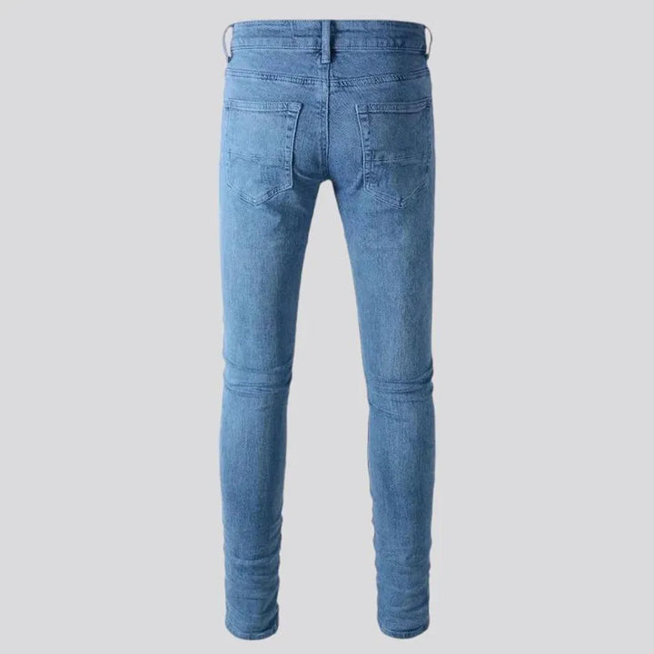 Distressed mid rise men's jeans