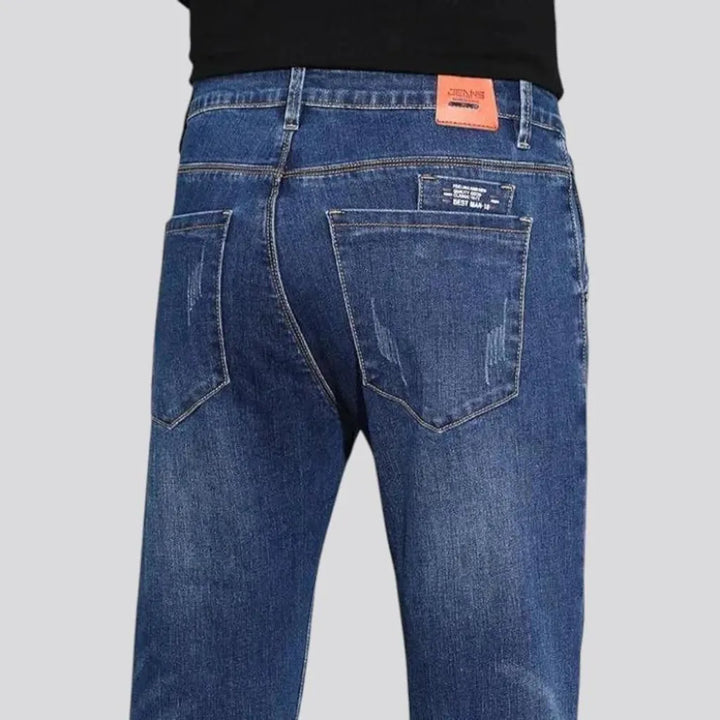 Fitted casual dark distressed jeans for men