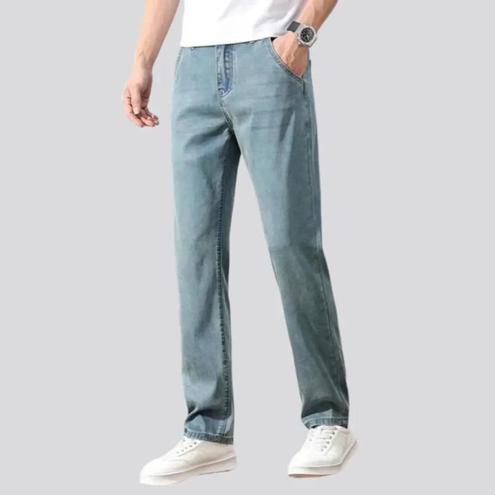 Thin men's stretch jeans