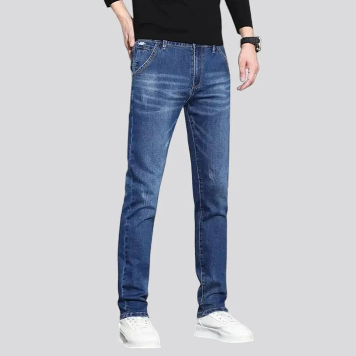 Dark abraded slim fit men's jeans