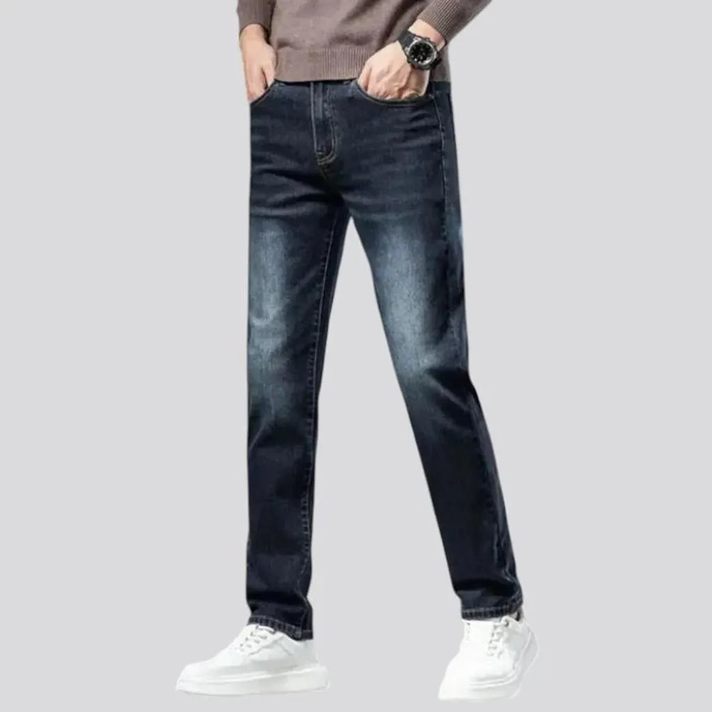 Stretchable dark fading jeans for men