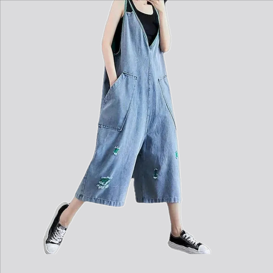 Stylish baggy-leg worn women's denim dungaree