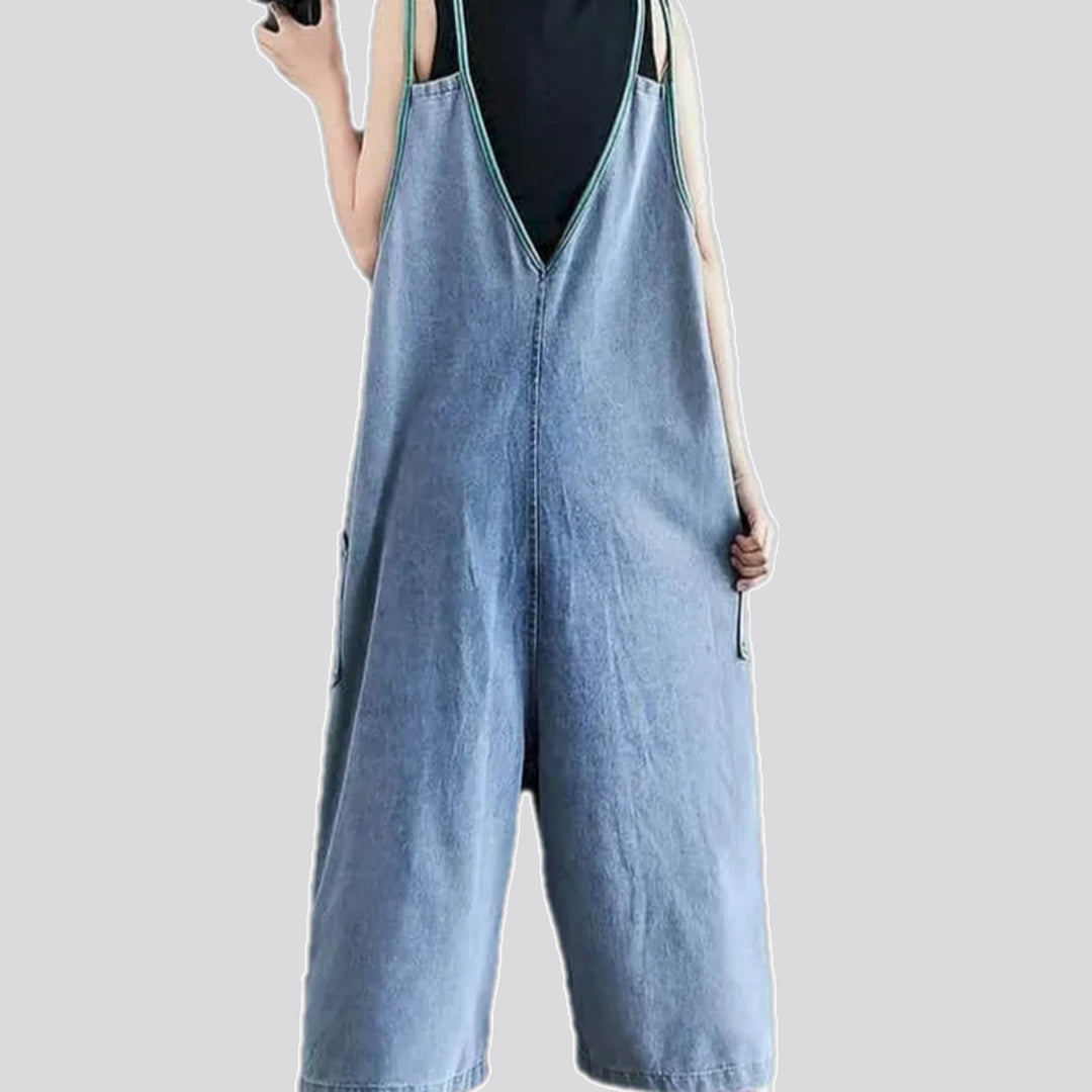 Stylish baggy-leg worn women's denim dungaree