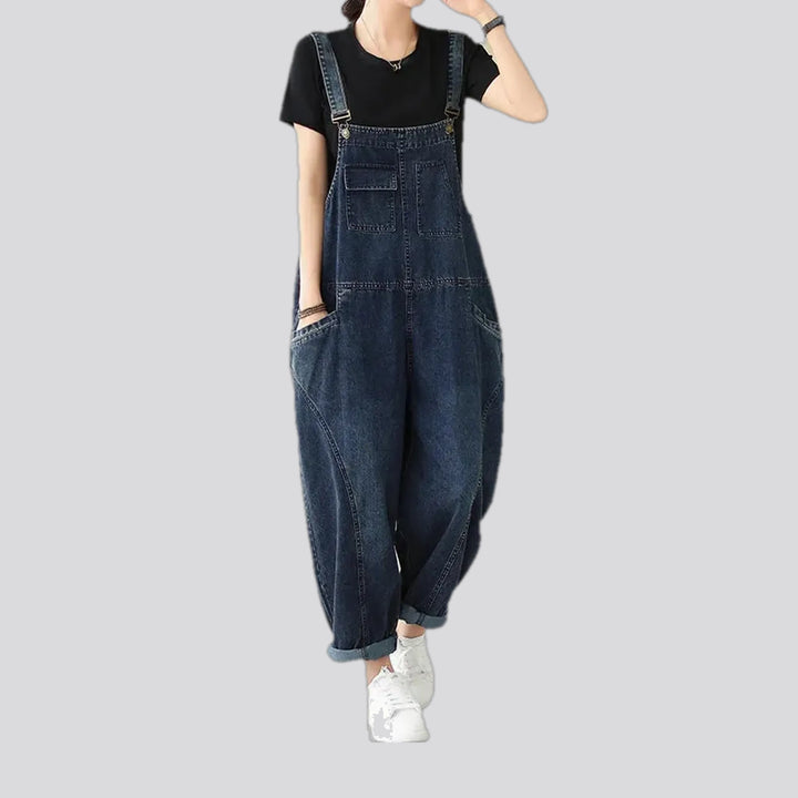 Slouchy dark 90s style women's denim dungaree