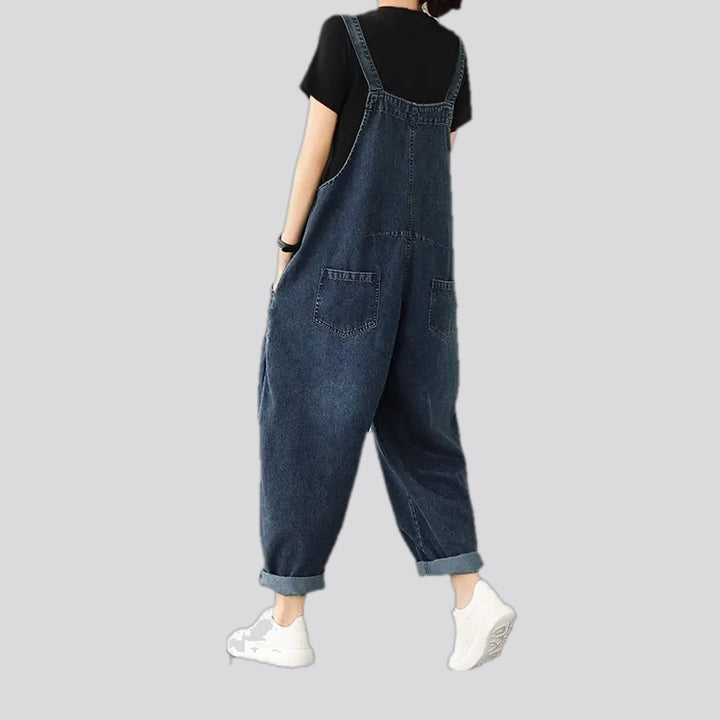 Slouchy dark 90s style women's denim dungaree