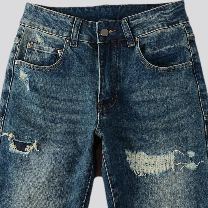 Distressed elastic men's jeans