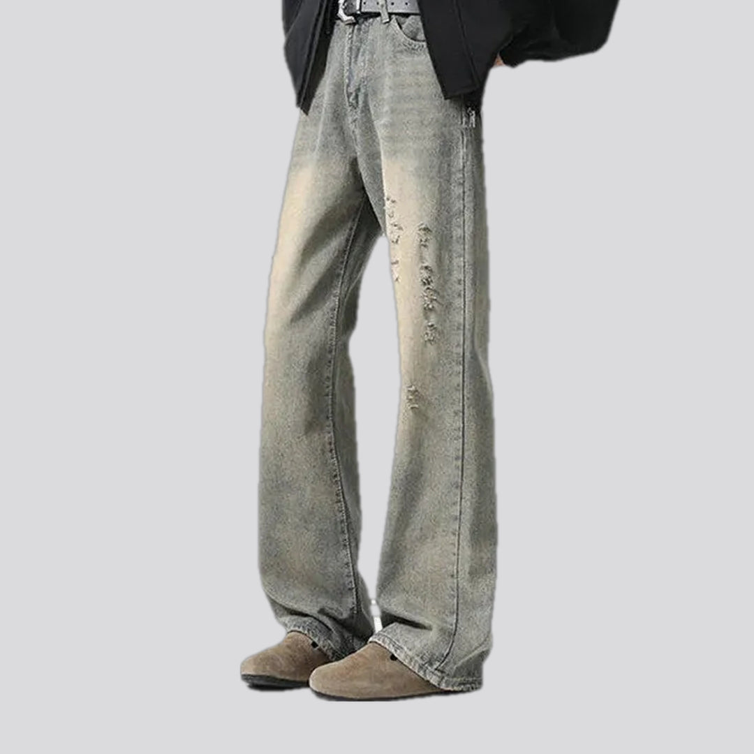 Fashionable bootcut distressed men's jeans