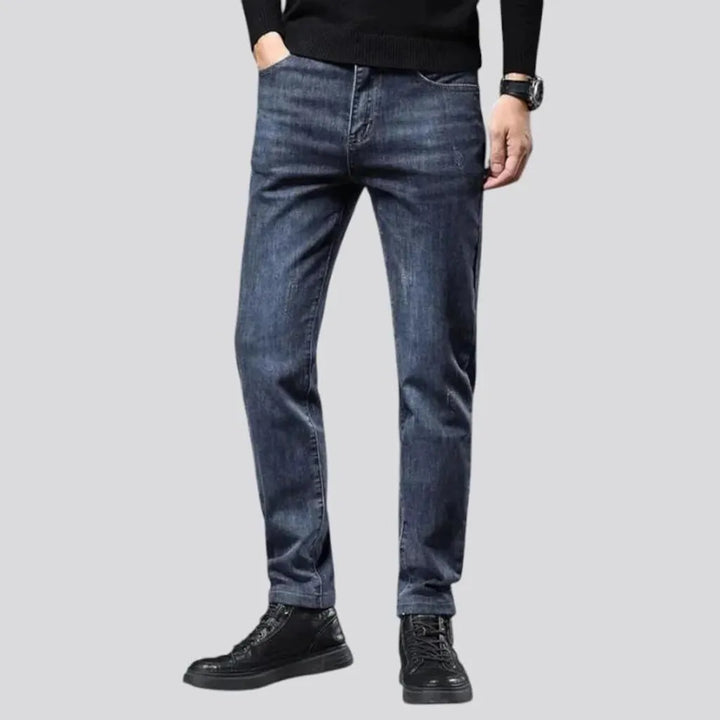 Elastic dark padded jeans for men