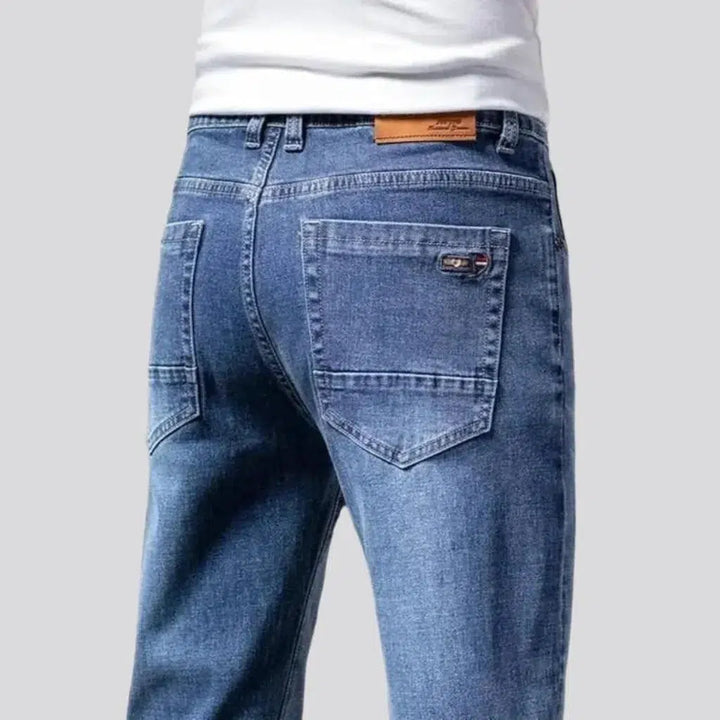 Stretchy men's tapered jeans