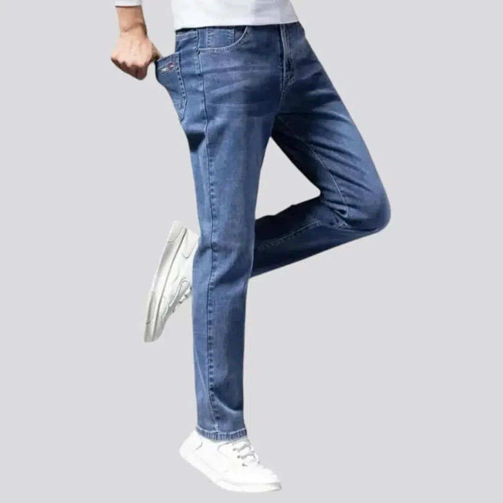 Stretchy men's tapered jeans