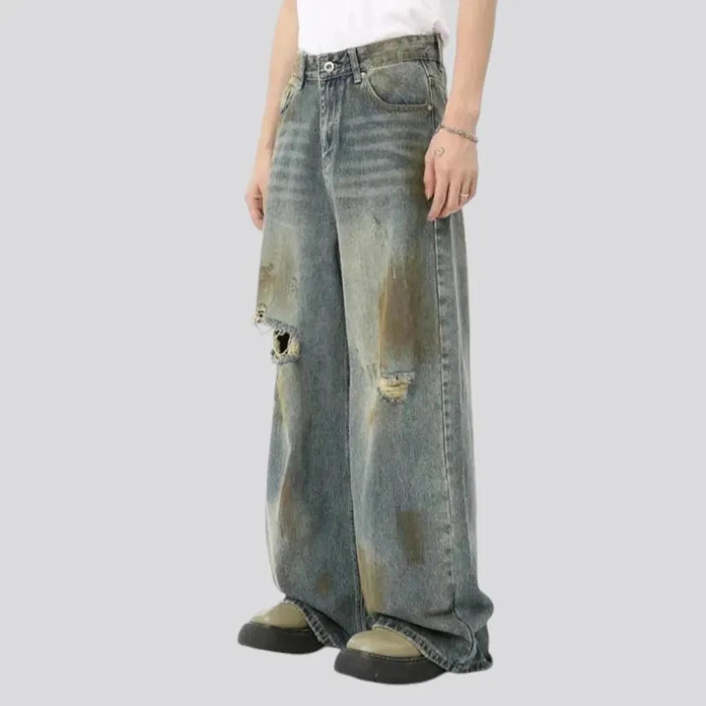 Boho style baggy distressed jeans for men