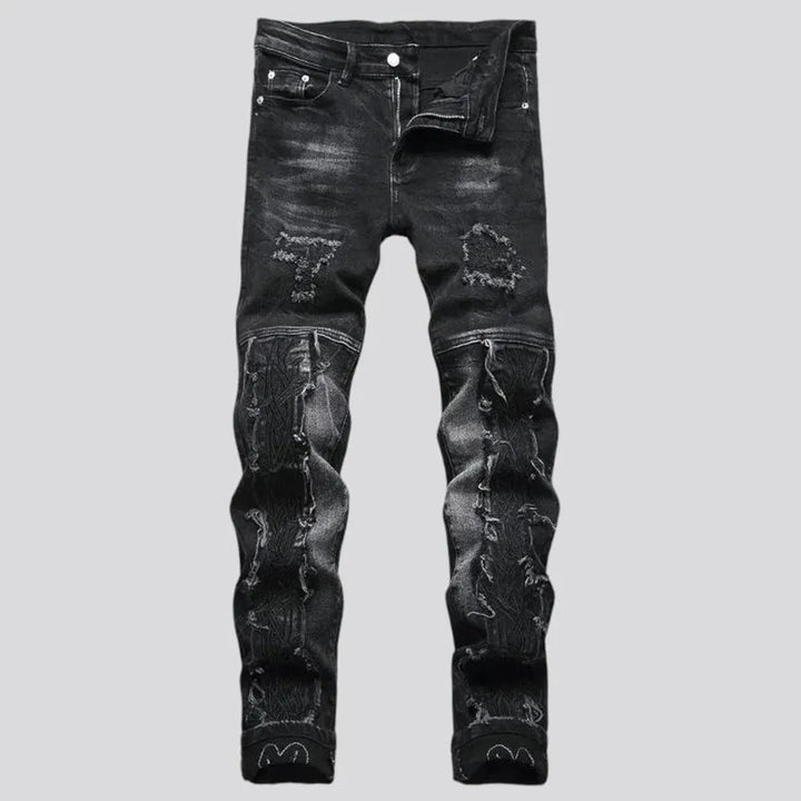 Whiskered embroidered distressed men's jeans