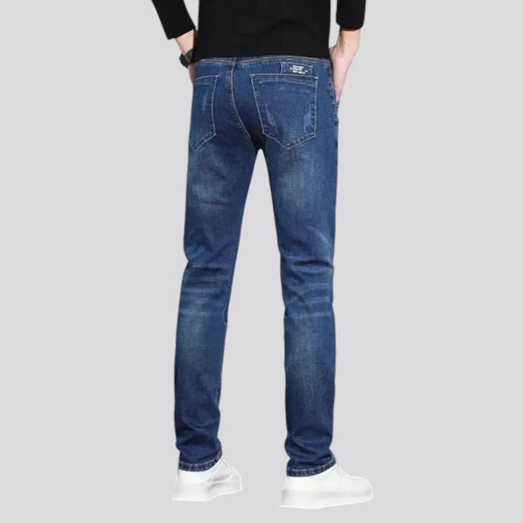 Fitted casual dark distressed jeans for men