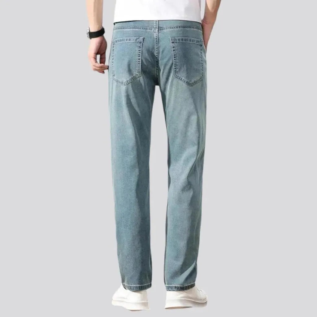 Thin men's stretch jeans