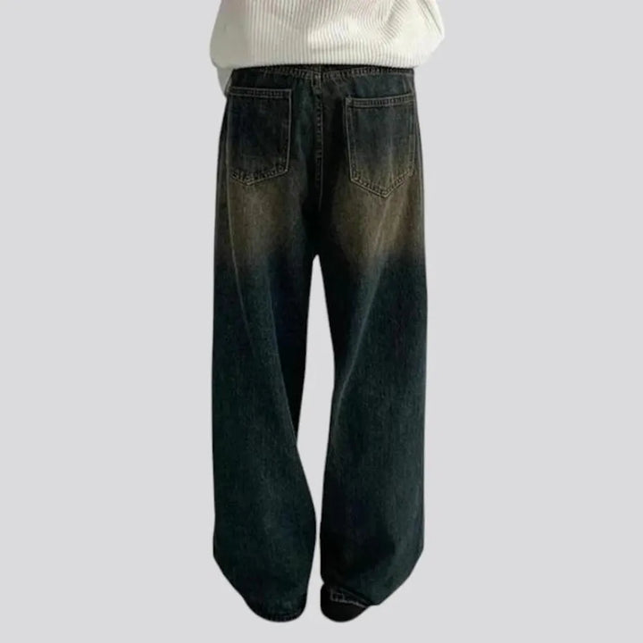 Dark mid rise 90s style men's jeans