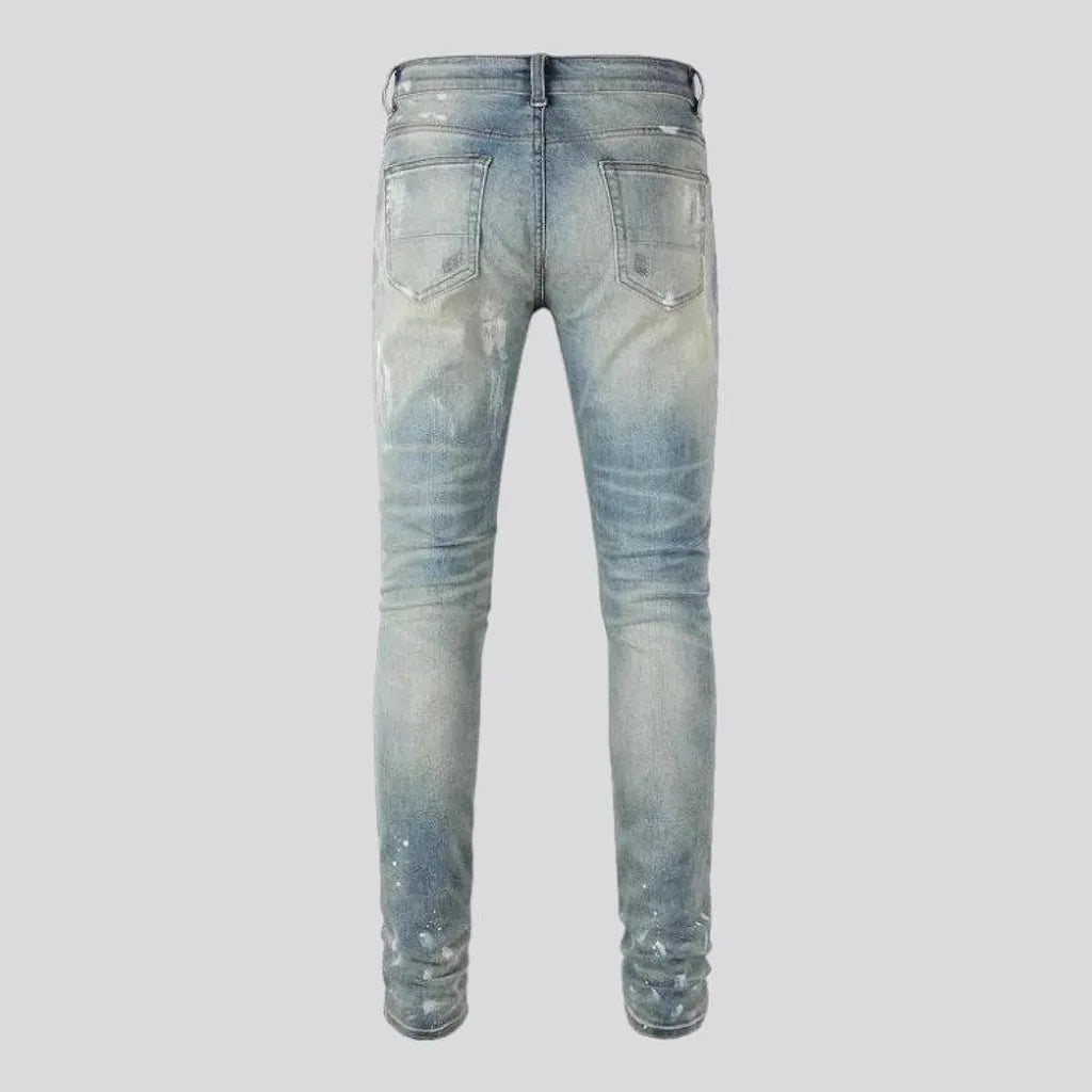 Grunge men's sanded jeans