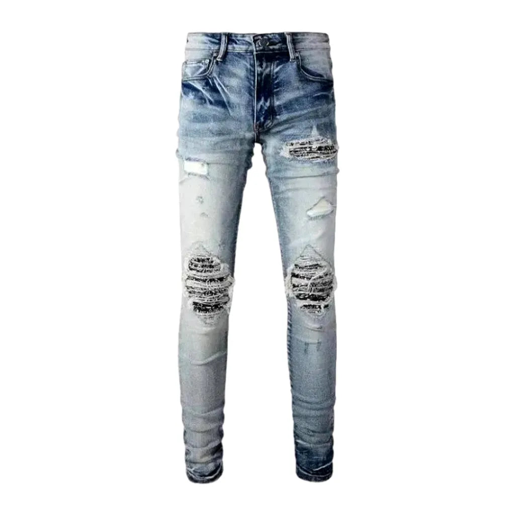 Patchwork men's whiskered jeans